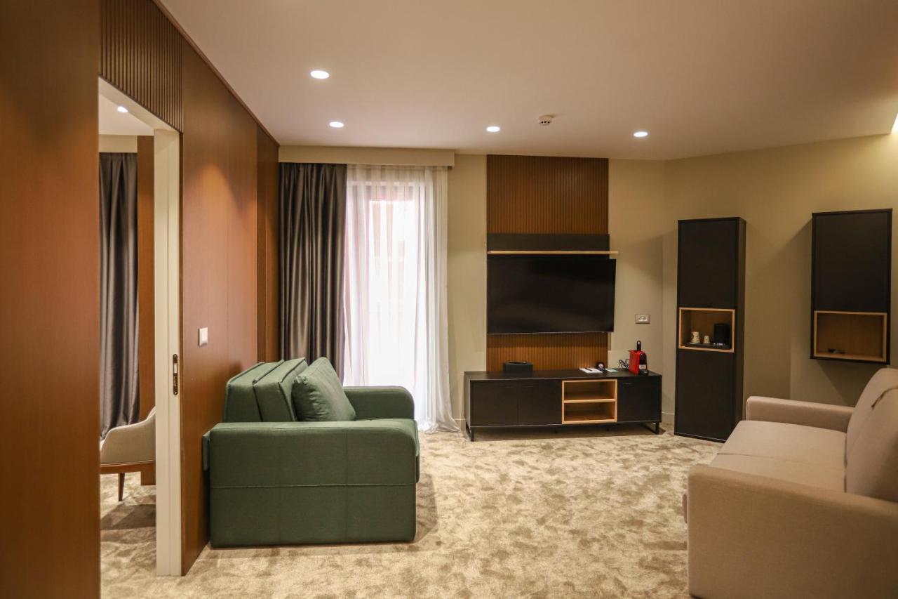 Urbanin Apartment & Hotel Тирана Экстерьер фото